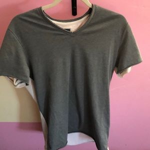 grey and white shirt